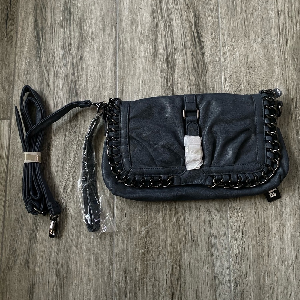 NWT blue clutch with strap and wristlet